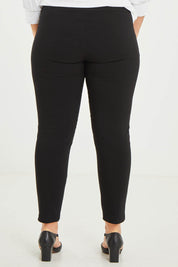 Model Katie wearing size 16 of The Stretch Career Pull On Pant in colour Black (Black), from the back