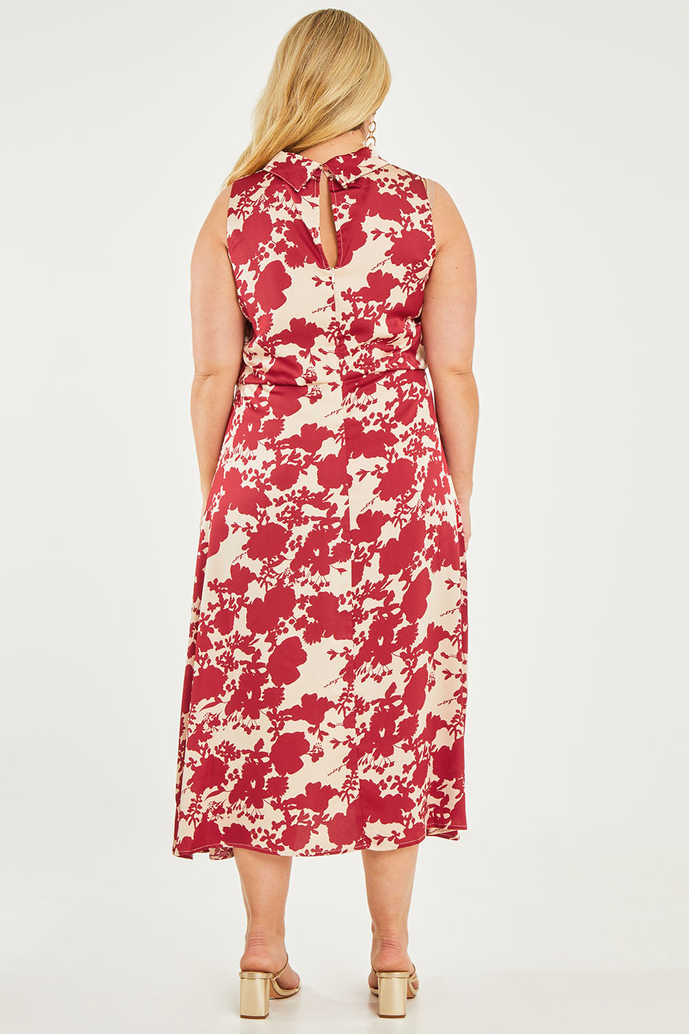 Model Katie wearing size 14 of The Printed Roll Neck Dress in colour Blossom (Red), from the back