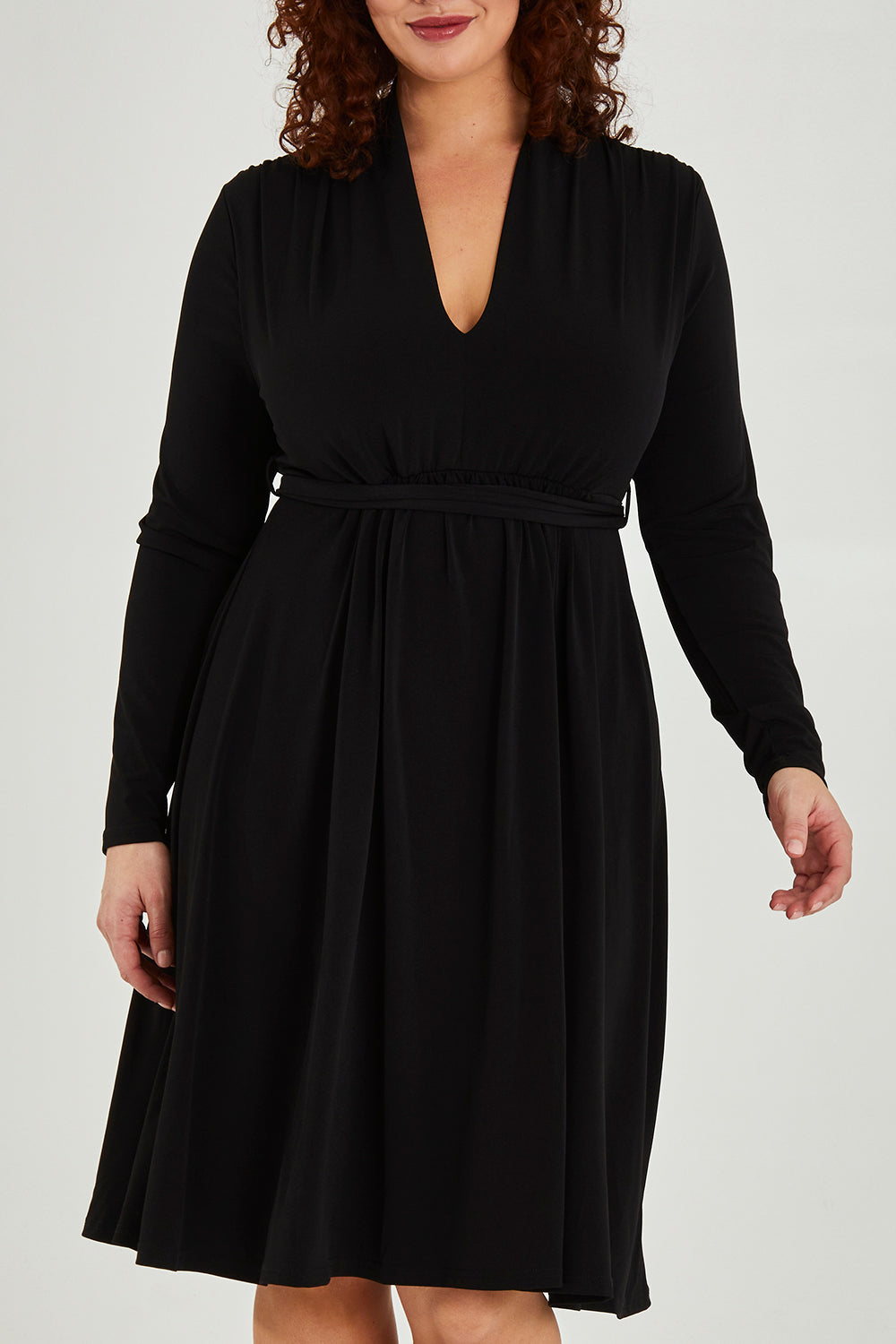 Model Maddy wearing size 16 of The Desk To Date Dress in colour Black (Black), from the front, cropped image