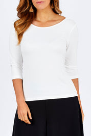 Model Laura wearing size 12 of The Reversible Cowl Neck Top in colour White (White), from the front, cropped image