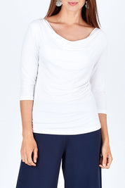Model Rebecca wearing size 10 of The Reversible Cowl Neck Top in colour White (White), from the front, cropped image