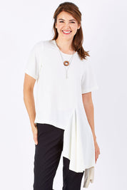 Model Rebecca wearing size 10 of The Side Panel Drape Top in colour OffWhite (White), from the front, cropped image