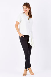 Model Rebecca wearing size 10 of The Side Panel Drape Top in colour OffWhite (White), from the front, showing the whole outfit