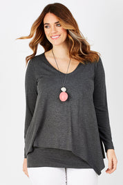 Model Laura wearing size 12 of the Belle V Neck Forgiver Tunic in colour Charcoal (Grey), from the front, cropped image