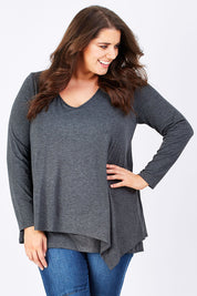 Model Mae wearing size 16 of the Belle V Neck Forgiver Tunic in colour Charcoal (Grey), from the front, cropped image