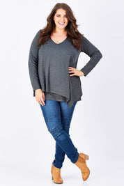 Model Mae wearing size 16 of the Belle V Neck Forgiver Tunic in colour Charcoal (Grey), from the front, showing the whole outfit