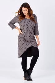 Model Laura wearing size 12 of the Belle Spot Print Tunic in colour KhakiSpot (Green), from the front, showing the whole outfit