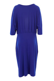 Product shot of the Belle Knot Front Cocktail Dress in colour Electric (Blue), from the back