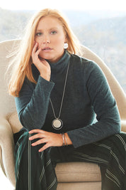 Model Mercy wearing size 12 of the Belle Wide Stripe Pant in colour GreenStrip (Green), from the front, showing the whole outfit