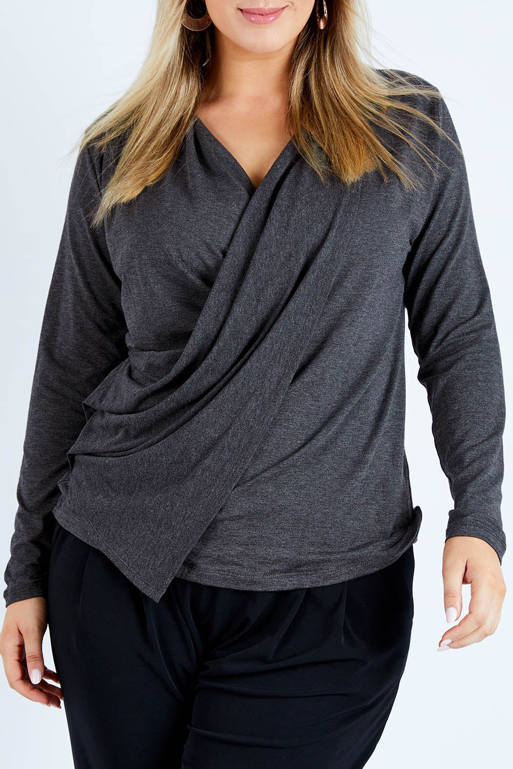 Model Jess wearing size 12 of the Belle Drape Top in colour Charcoal (Grey), from the front, cropped image