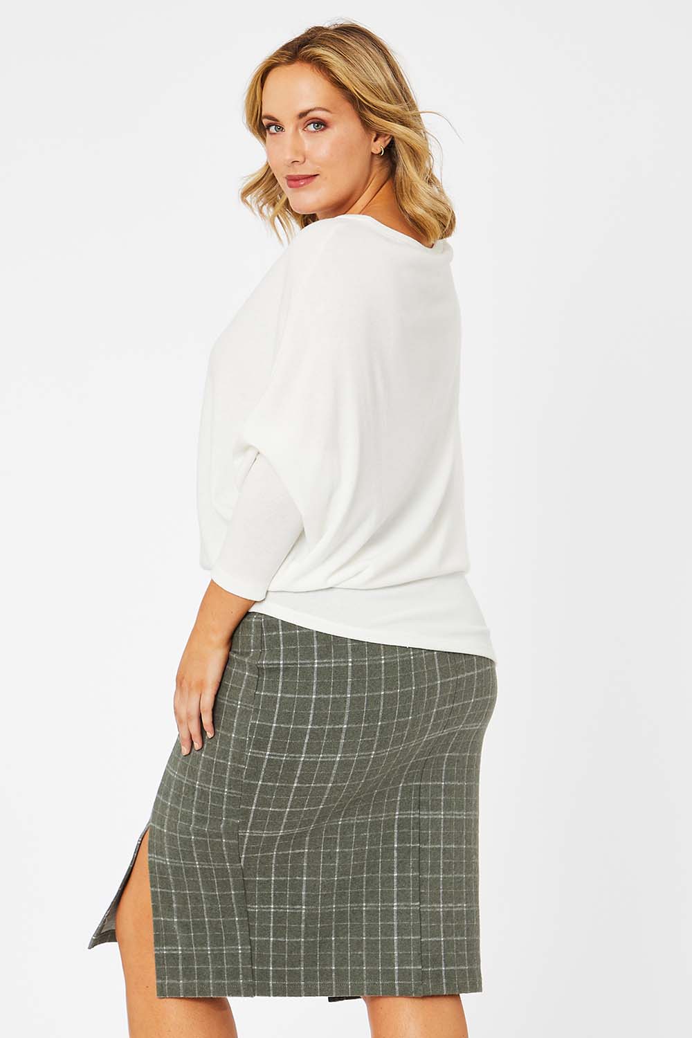 Model Jess wearing size 14 of the Belle Check Cotton Rich Pencil Skirt in colour Check (Green), from the back