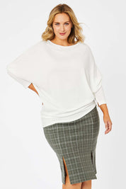 Model Jess wearing size 14 of the Belle Check Cotton Rich Pencil Skirt in colour Check (Green), from the front, cropped image