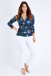 Model Laura wearing size 12 of the Belle Paradise Floral Top in colour Paradise (Black), from the front, showing the whole outfit