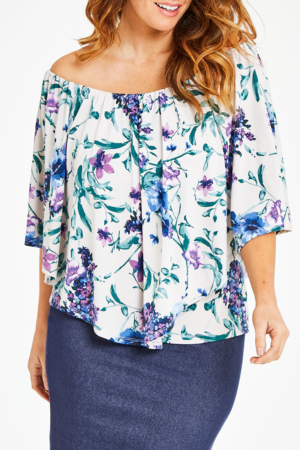 Model Laura wearing size 12 of the Belle Lavender Floral Top in colour Lavender (Purple), from the front, cropped image