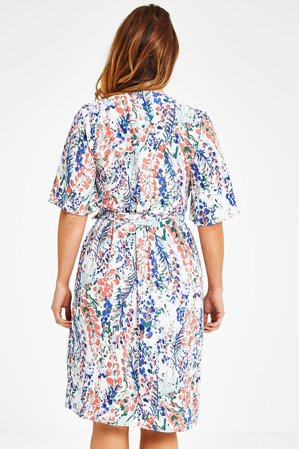 Model Laura wearing size 12 of the Belle Scatter Floral Kimono Sleeve Dress in colour Scatfloral, from the back