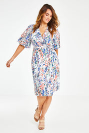 Model Laura wearing size 12 of the Belle Scatter Floral Kimono Sleeve Dress in colour Scatfloral, from the front, showing the whole outfit