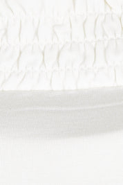 Product shot of the Belle Turtleneck Draped Bamboo Tee in colour Ivory (White), detail