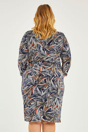 Model Caitlin wearing size 20 of the Belle Classic Lined Wrap Jersey Dress in colour Navyprint (Blue), from the back