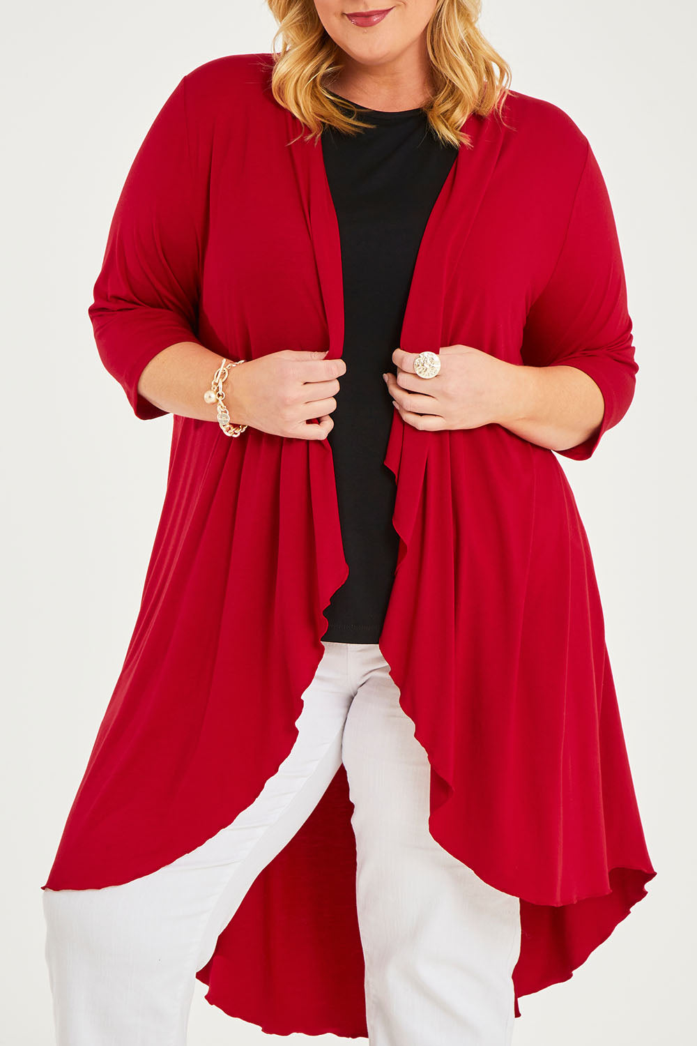 Model Caitlin wearing size 20 of the Belle Luxe Bamboo Cardigan in colour Red (Red), from the front, cropped image
