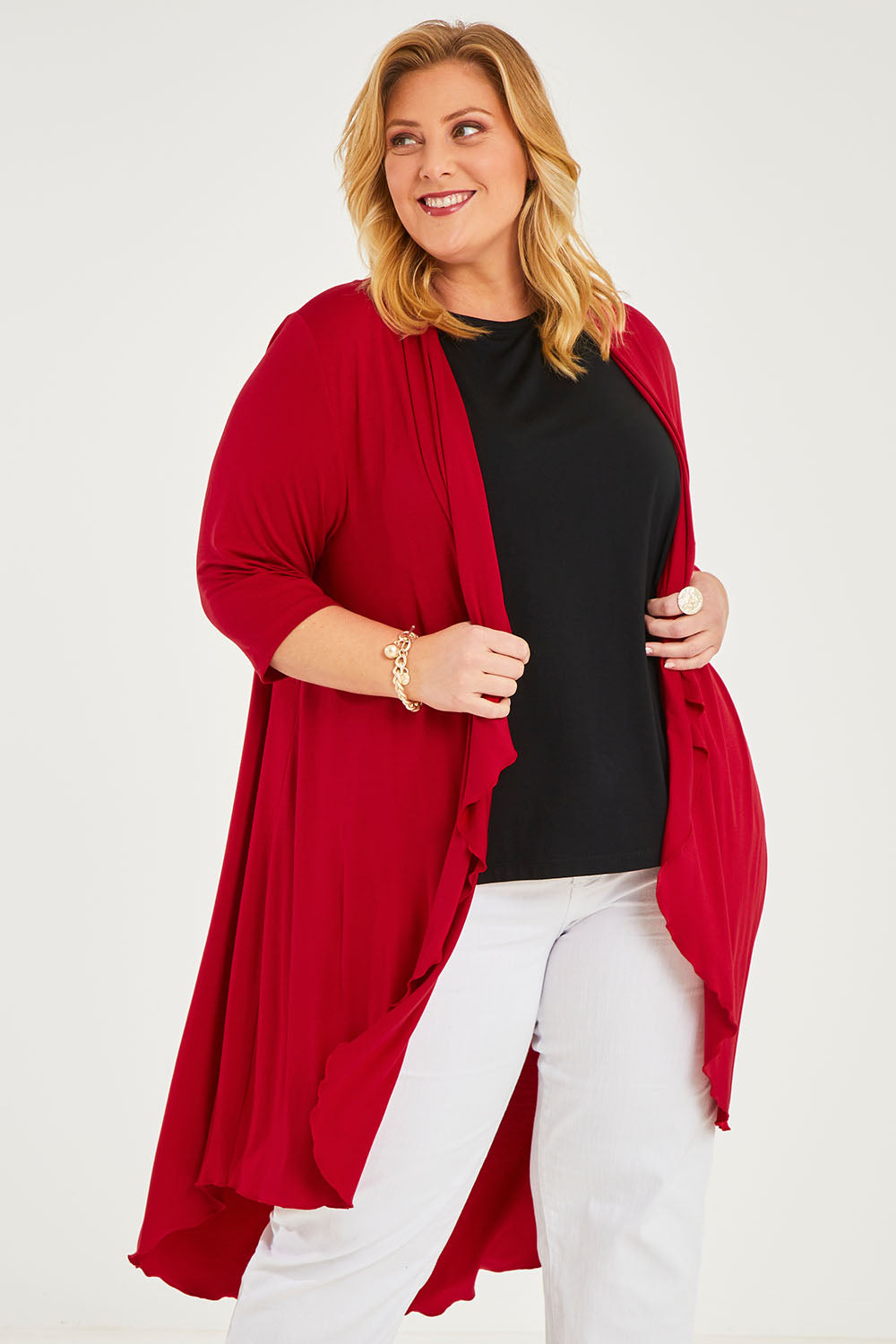 Model Caitlin wearing size 20 of the Belle Luxe Bamboo Cardigan in colour Red (Red), from the front, cropped image