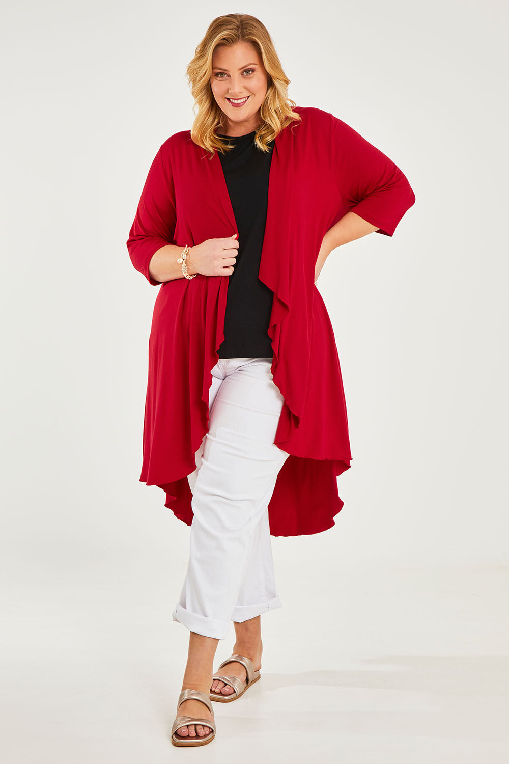 Model Caitlin wearing size 20 of the Belle Luxe Bamboo Cardigan in colour Red (Red), from the front, showing the whole outfit