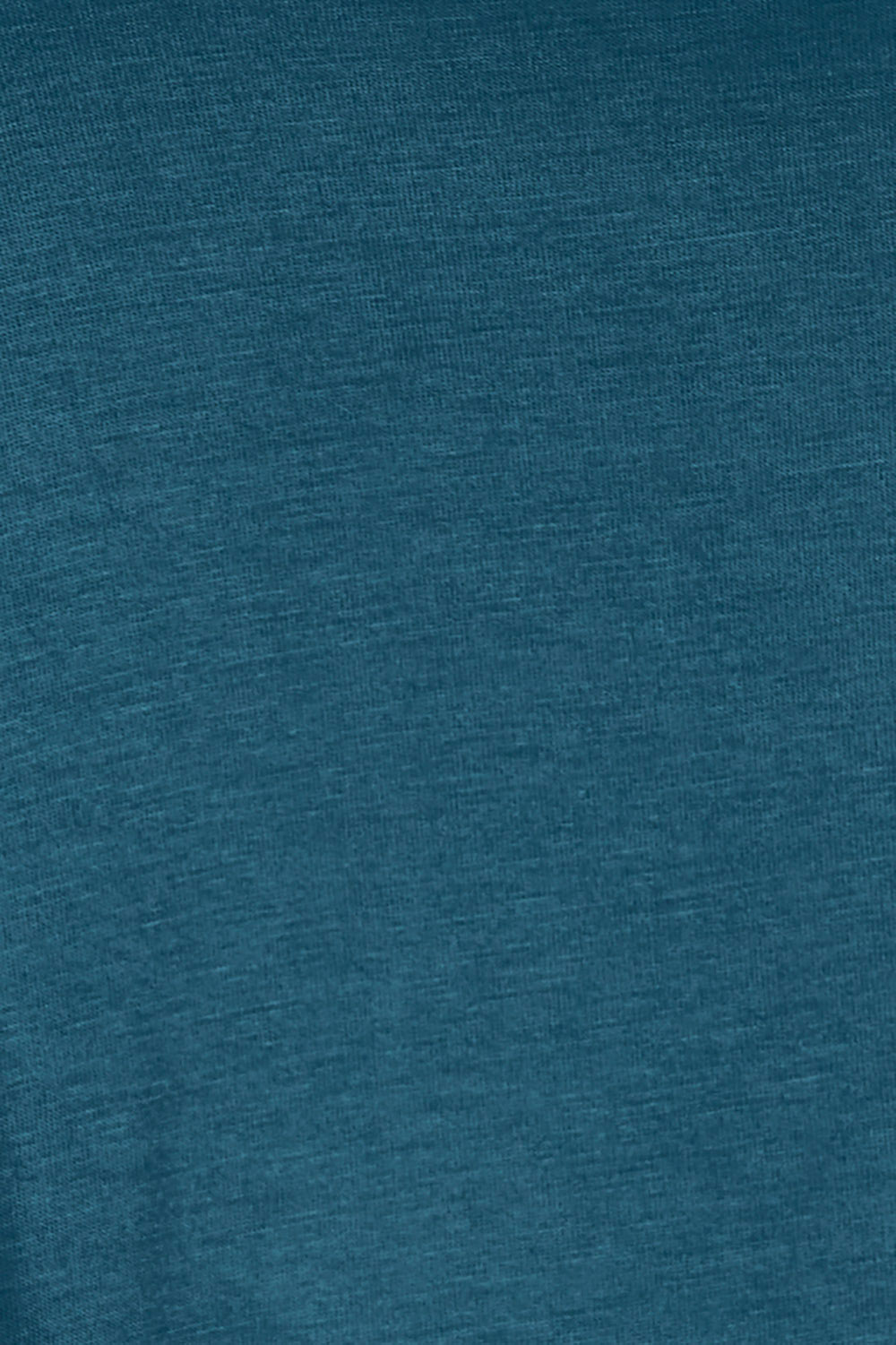 Product shot of the Belle High Low Bamboo Tee in colour Petrol (Blue), detail