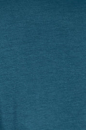 Product shot of the Belle High Low Bamboo Tee in colour Petrol (Blue), detail