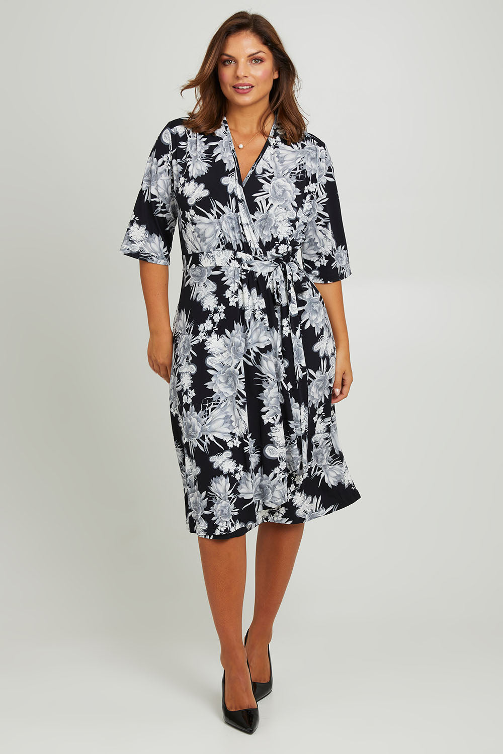 Model Monique wearing size 14 of the Belle Classic Full Skirt Dress in colour Blackgrey (Black), from the front, showing the whole outfit