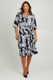 Model Monique wearing size 14 of the Belle Classic Full Skirt Dress in colour Blackgrey (Black), from the front, showing the whole outfit