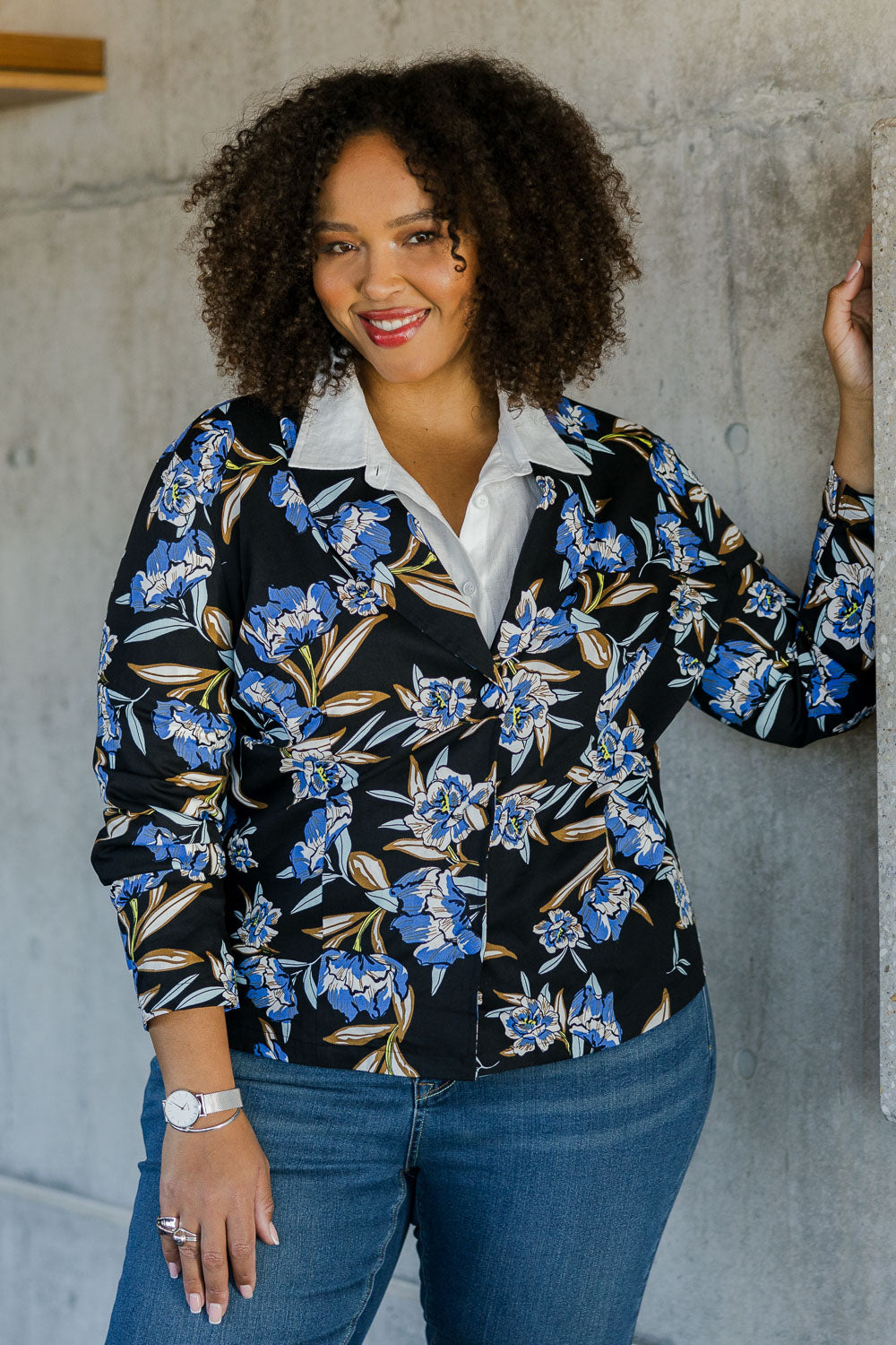 Model Alexis wearing size 18 of the Belle Stretch Printed Blazer in colour Bluefloral (Blue), from the front, showing the whole outfit