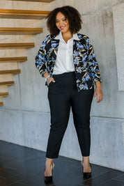 Model Alexis wearing size 18 of the Belle Stretch Printed Blazer in colour Bluefloral (Blue), from the front, showing the whole outfit