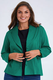 Model Monique wearing size 14 of the Belle Stretch Classic Blazer in colour Teal (Green), from the front, cropped image