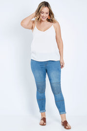 Model Jess wearing size 14 of the Wild Heart Stitched Jeggings in colour Lightdenim (Blue), from the front, showing the whole outfit