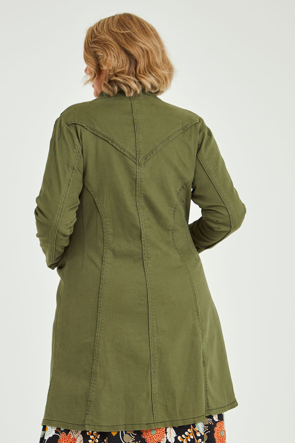 Model Fiona wearing size 16 of the Attention To Me Jacket in colour Khaki (Green), from the back