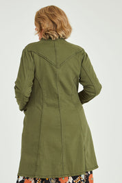 Model Fiona wearing size 16 of the Attention To Me Jacket in colour Khaki (Green), from the back