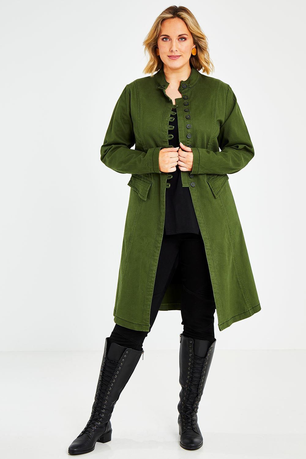 Model Jess wearing size 14 of the Attention To Me Jacket in colour Khaki (Green), from the front, showing the whole outfit