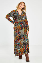 Model Jess wearing size 14 of the Life Is Beautiful Wrap Maxi Dress in colour Marrakesh (Red), from the front, showing the whole outfit