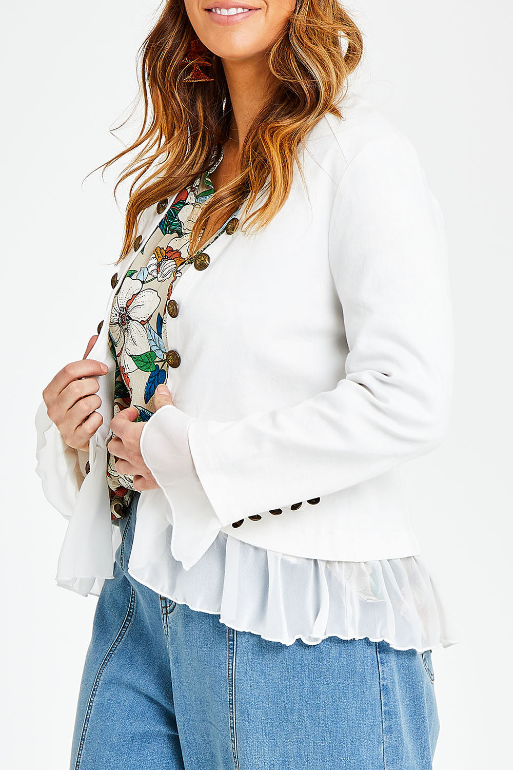 Model Laura wearing size 14 of the Commander Of Love Jacket in colour Milk (White), from the front, cropped image