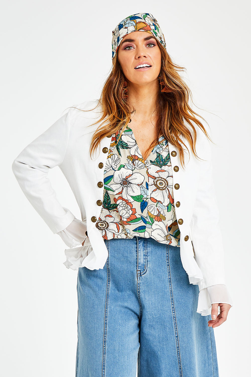 Model Laura wearing size 14 of the Commander Of Love Jacket in colour Milk (White), from the front, cropped image