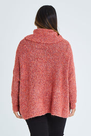 Model Palatina wearing size XL of the Soft Cloud Roll Neck Jumper in colour Brick (Red), from the back