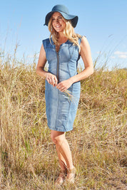 Model Olivia wearing size 12 of the Adore Me Denim Dress in colour Denim (Blue), from the front, showing the whole outfit