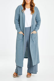 Model Laura wearing size 14 of the Watching Sunset Lounge Cardi in colour Duckegg (Blue), from the front, cropped image