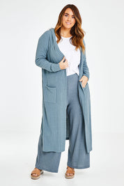 Model Laura wearing size 14 of the Watching Sunset Lounge Cardi in colour Duckegg (Blue), from the front, showing the whole outfit