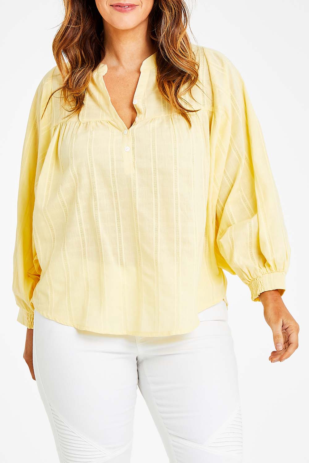 Model Laura wearing size 14 of the Easy Like A Sunday Morning Blouse in colour Buttermilk, from the front, cropped image