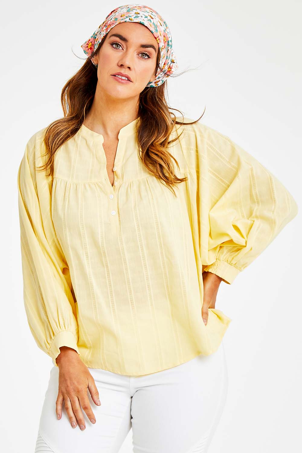 Model Laura wearing size 14 of the Easy Like A Sunday Morning Blouse in colour Buttermilk, from the front, cropped image