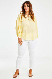 Model Laura wearing size 14 of the Easy Like A Sunday Morning Blouse in colour Buttermilk, from the front, showing the whole outfit