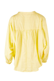 Product shot of the Easy Like A Sunday Morning Blouse in colour Buttermilk, from the back