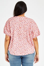 Model Sasha-Lee wearing size 16 of the Its All In The Sleeve Cotton Blouse in colour Peach (Pink), from the back
