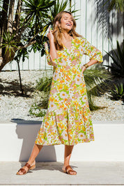 Model Ilona wearing size 10 of the Daisy Chain Love Maxi Dress in colour Daisy (White), from the front, showing the whole outfit