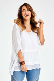 Model Laura wearing size 14 of the You See Through Me Blouse in colour White (White), from the front, cropped image